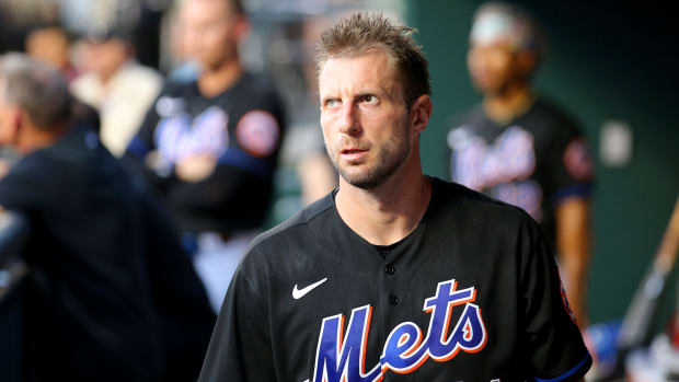 Max Scherzer in the Mets dugout.